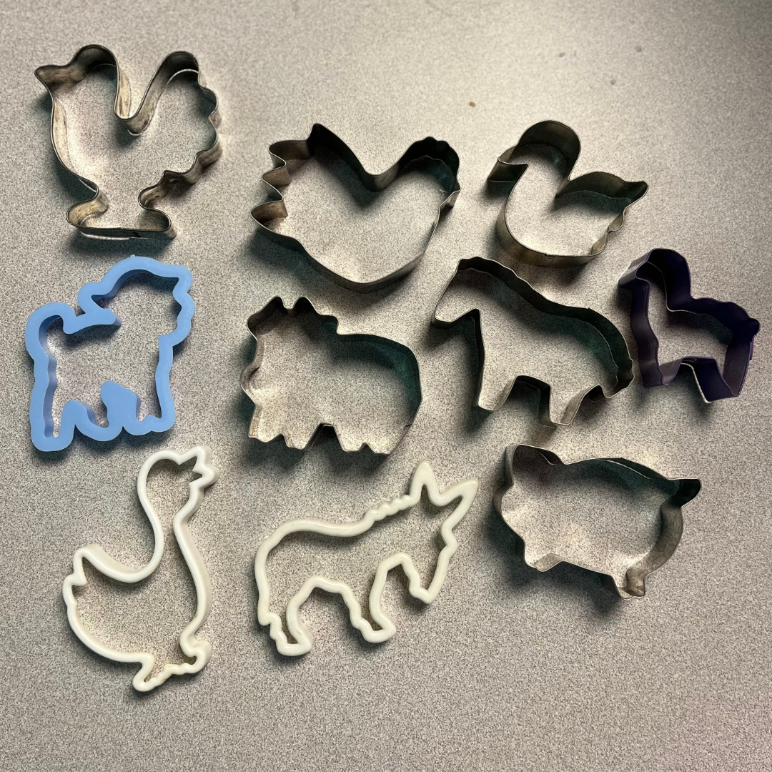 mix of stainless steel and plastic farm animal cookie cutters