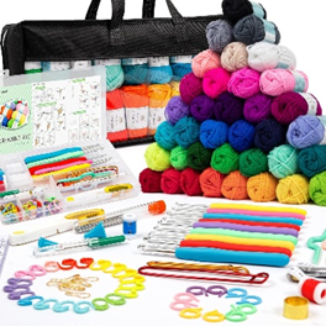 black clear bag of yarn, multicolored skeins or yarn and variety of crochet tools