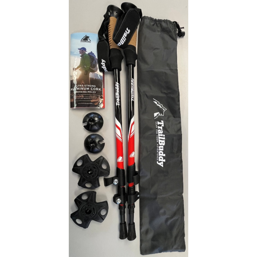 black nylon bag, two black trekking poles, instruction booklet and attachments on white background